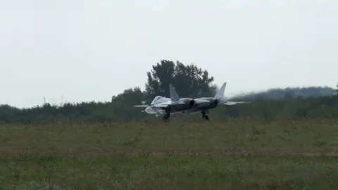 Su-57 fifth-generation multi-functional fighter takes off. Afterburner works. Stock Footage 115242034