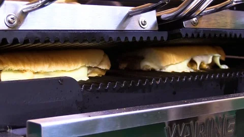 Sub sandwich pressed in a panini grill Stock-Footage 105983674