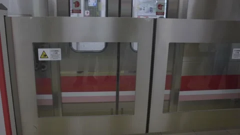 Sub way train pulls up gate opens Stock Footage 232641183