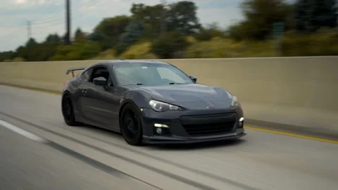 Subaru BRZ on highway Stock Footage 164409385