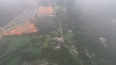 Subdivision construction development seen through breaking clouds Stock Footage 137661398