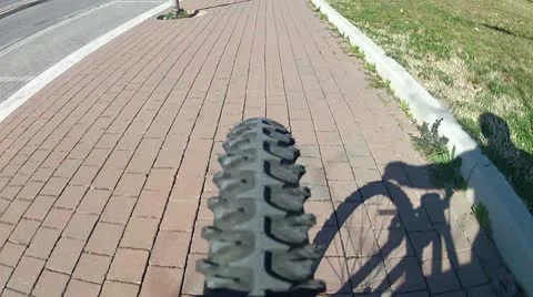 Subjective on bike with man shadow Stock Footage 10791827
