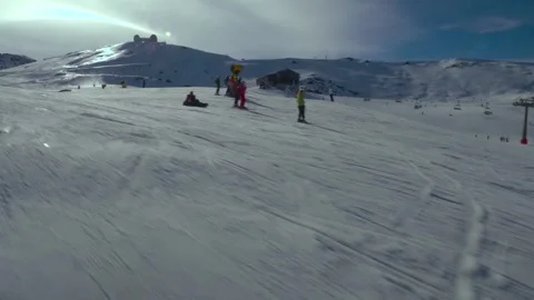 Subjective view of a snowmobile climbing a snow-covered ski slope Stock Footage 265232121