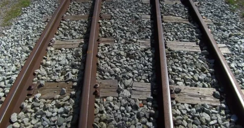 Subjective vision in motion over old train tracks. Stock Footage 119384973
