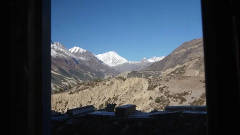Subjetive personal view from inside room to Annapurna range. 60fps. 스톡 동영상 129961555