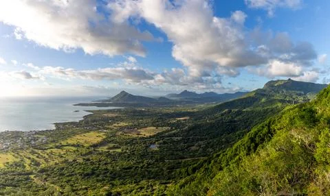 Sublime Point view of mountains and coastline in Mauritius at sunset Stock Photos