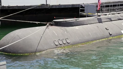Submarine docked at bay Stock Footage 157662568