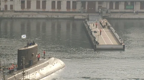 Submarine returns to base Stock Footage 35553324