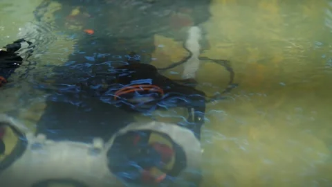 Submarine thrusters behind murky currents, Closeup of underwater propellers amid Stock Footage 324683516