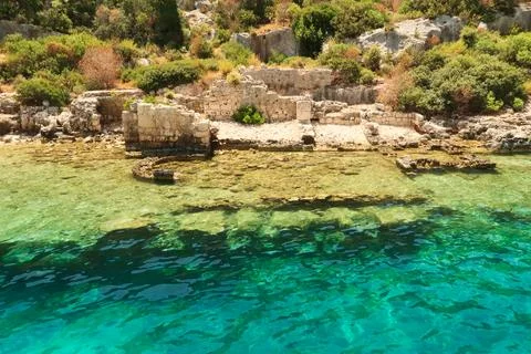 Submerged foundation in the foreground and structures onshore in the backgr.. Stock Photos