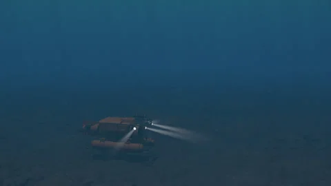 Submersible ROV working at the bottom of deep sea Stock Footage 245230100