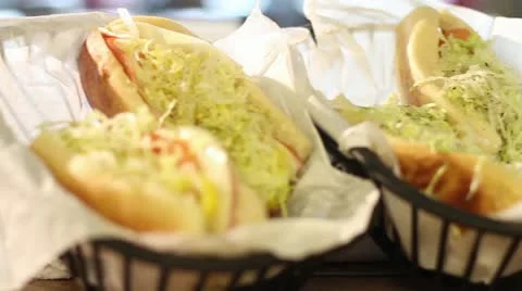 Subs and Salad in baskets ready to eat slider camera movement Stock Footage 13249789