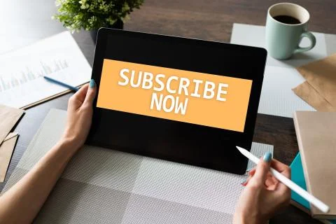 Subscribe button on device screen.  Internet and digital marketing concept. Stock Photos