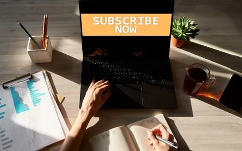 Subscribe button on device screen. Internet and digital marketing concept. Stock Photos