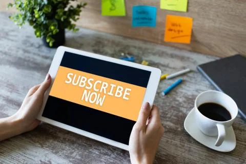 Subscribe button on device screen. Internet and digital marketing concept. Stock Photos