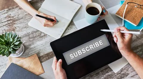 Subscribe button on device screen. Internet and digital marketing concept. Stock Photos