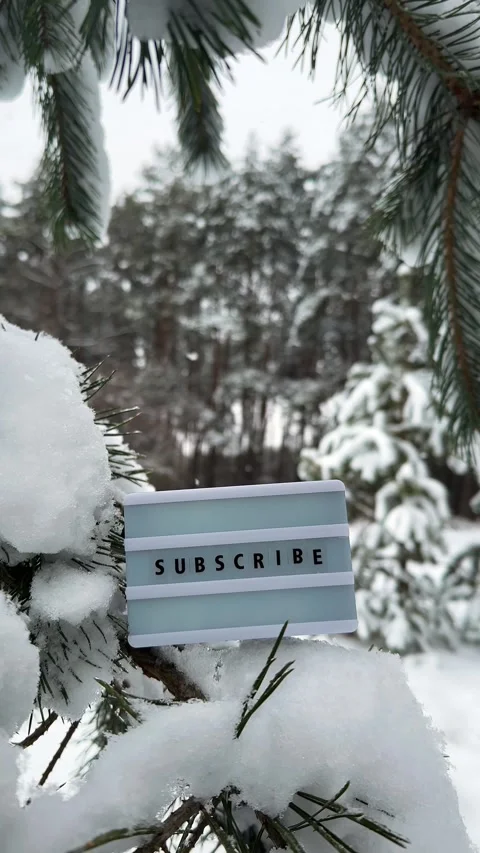Subscribe message on a letter light box with snowfall background Видео 260605844