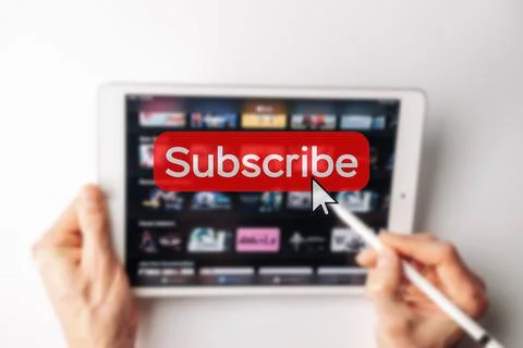 Subscription plan. Red online video subscribe button. Internet service on lap Stock Photos