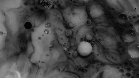Substance being analyzed under a microscope in a close-up shot. Stock Footage 343900455