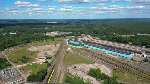 Substation distributing electricity close to forest. Perfect aerial view flight Vídeo Stock 315641376
