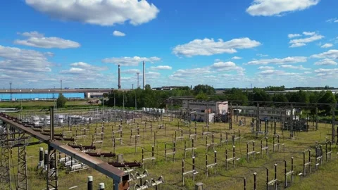 Substation distributing electricity at forest. Nice aerial view flight drone Vídeo Stock 315474380