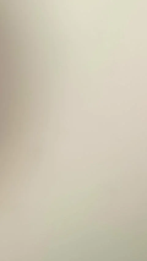 Subtle beige backdrop soft shadow ideal for modern, minimalist designs offering 動画素材 318610727