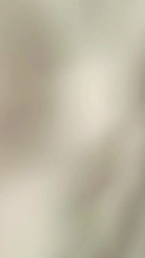 Subtle beige background with soft light shadow gentle motion, perfect for adding Stockbeeldmateriaal 318610692