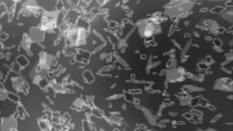 Subtle black speckles softly flickering across clean white background Stock-Footage 339749192