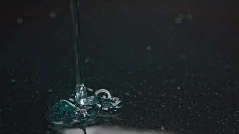 Subtle blue gel forming delicate patterns on a dark background, suitable fo.. Stock Footage 262310361