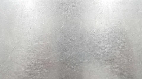 Subtle brushed metal surface with soft light reflections and minimal scratc.. Stock Illustration