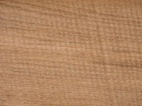 Subtle diagonal wave pattern on a European oak wood veneer surface Stock Photos