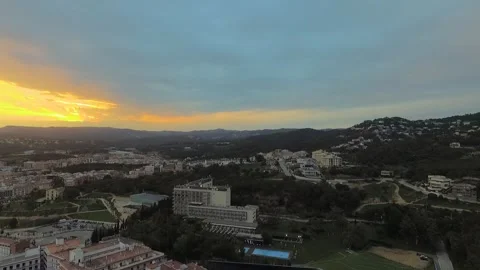 Subtle Drone Pull Back Over Costa Brava Town at Sunset Vídeos de archivo 336739499