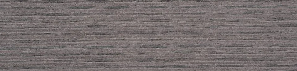Subtle elegance in slate grey tones on a seamless ash wood veneer surface Stock Photos