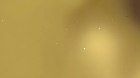 Subtle gold gradient background with scattered light points. Stock Photos