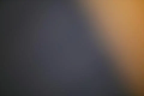 Subtle Gradient Background with Dark Gray and Warm Orange Tones Stock Photos