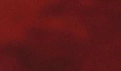 Subtle gradient effect on a textured red background Foto stock