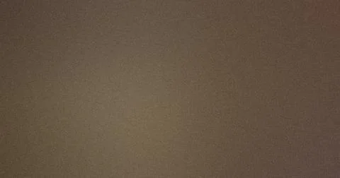 Subtle gradient over a grainy dark brown background Foto stock