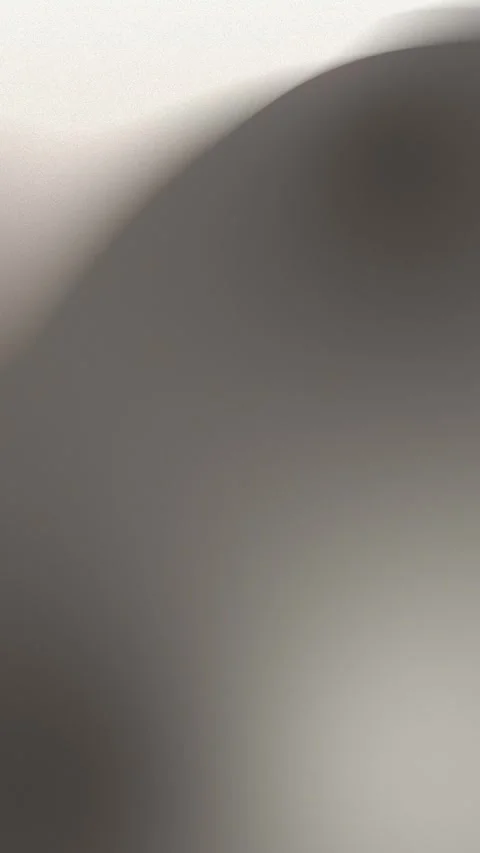 Subtle gradient with smooth curves in brown and cream tones. Seamless loop Stock Footage 309956651