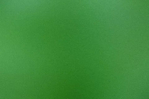 Subtle grain texture on a green gradient background 写真素材