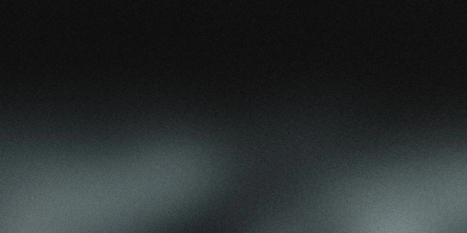 Subtle grainy gradient fading from dark to light gray, ideal for background.. Stock Photos