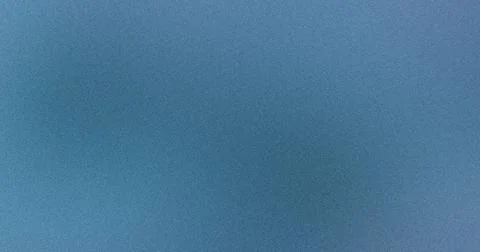Subtle grainy texture on a blue gradient background 스톡 사진