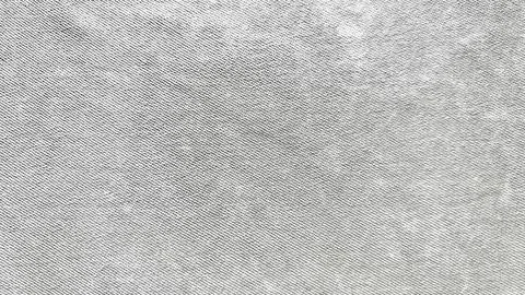 Subtle gray woven fabric texture closeup evoking minimalist industrial mood.. Stock Photos