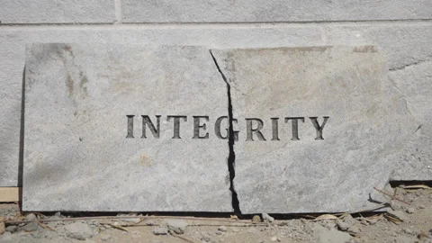 Subtle Handheld Footage of Broken Integrity Stone Plaque Stock Footage 316925552