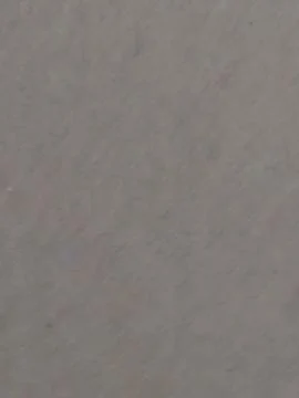 A subtle light beige textured background features faint organic lines creatin Foto stock