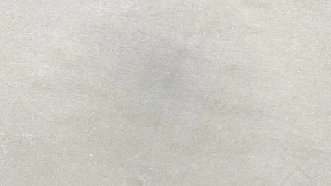 Subtle light gray fabric texture with central fade evoking serene minimalis.. Foto stock