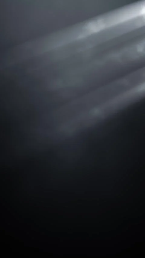 Subtle light rays shining through grey smoky clouds, foggy haze background Stock Footage 302832925