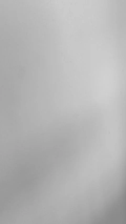 Subtle light soft shadow movement across a smooth, metallic surface, perfect for Video stock 318610771