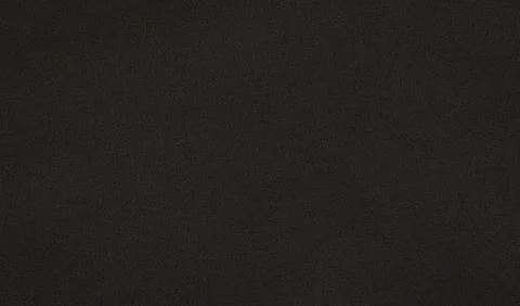 Subtle pattern created by grainy texture on dark grey background Stock Photos