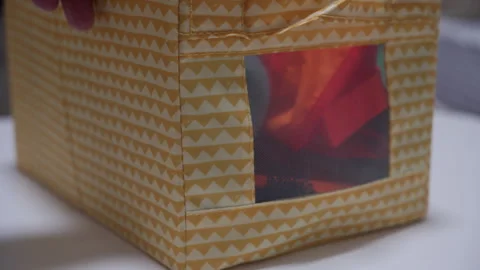 Subtle Rustling Sound as Patterned Fabric Storage Box Moves. Stock Footage 321207566