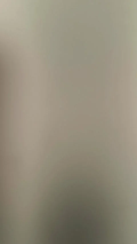 Subtle soft shadow movement across a smooth, creamy surface creates a calming, Video stock 318610728